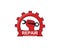 image of hand holding wrench inside gear for repair workshop service vector logo design