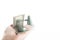 Image of hand miniature lamp money