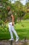 Image handsome young African American man balancing on a fitness post in the park