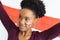 Image of happy african american woman with flags of england on face over flag of england