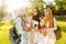 Image of happy friends muslim sisters women walking outdoors