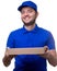 Image of happy man in blue T-shirt and baseball cap with cardboard box for pizza