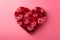 image of a heart made with red and pink roses on a pink background, love is in the air, Valentines theme