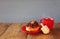 image of jewish holiday Hanukkah with donuts, wooden spinning top and cup of hot chocolate