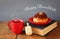 image of jewish holiday Hanukkah with donuts, wooden spinning top, cup of hot chocolate and old book.