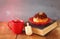 image of jewish holiday Hanukkah with donuts, wooden spinning top, cup of hot chocolate and old book.
