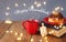 image of jewish holiday Hanukkah with donuts, wooden spinning top, cup of hot chocolate and old book.