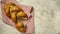 Image of jewish traditional challah bread on a kitchen towel on a white background. Flat lay. Copy space