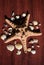 Image with a large sea star surrounded by many shells. Starfish on wood background. Elements of sea and ocean. Vacation memories