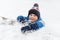 Image of little boy in snow on park