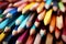 Image Macro shot of many colored pencils, forming a colorful background