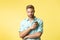 image of man with perfumery. man with perfumery. man with perfumery isolated on yellow.