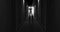 Image of man silhouette standing in dark corridor