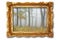 Image with misty forest on ancient picture frame