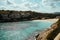 Image moored yachts on bright blue bay Cala Blanca Andratx, Palma de Mallorca, rocky coast breathtaking view, Balearic