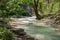 Image of a mountain watercourse during an excursion on foot in the Scalelle path in Caramanico Terme Abruzzo Italy.