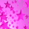 Image of multiple bright pink stars on light pink background