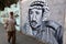 An image a mural depicting Former Palestinian leader Yasser Arafat are seen on his 16th death anniversary in Rafah, in the souther