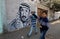 An image a mural depicting Former Palestinian leader Yasser Arafat are seen on his 16th death anniversary in Rafah, in the souther