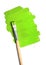 Image of paintbrush and green paint spot isolated