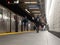 Image of people getting on a subway train in WTC Cortlandt station, New York.