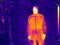 Image of a person in a thermal imager on the street