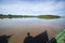 Image in Peruvian jungle of a boat in a river in Amazon forest. Traditional way of transportation in tropical rivers