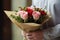 An image portraying a person surprising their loved one with a romantic gesture, such as presenting a bouquet of roses, planning a