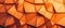 This image presents a warm, inviting background of geometric tiles in rich orange hues. The seamless pattern exudes a