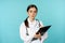 Image of professional woman doctor, physician with clipboard writing, listening patient at hospital clinic appointment