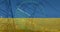 Image of radar and electricity poles over flag of ukraine