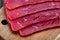 Image of raw a beef fillet cut into pieces.