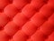 Image of a red luxurious stylish upholstered background with the buttons.