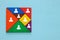 image of retro tangram puzzle with people icons