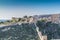 Image of a rocky hill with the walls and the Alcazaba in the background in Almeria Spain