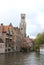 Image of Rozenhoedkaai, Dijver Canal in the cloudy day in Bruges, Belgium.