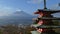 Image of the sacred mountain of Fuji in the background of blue s
