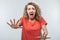 Image of scared blonde girl. Fright, phobia and facial expression concept. Studio shot, white background, isolated