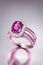 An image showcasing the exquisite beauty of a natural pink sapphire set in a luxurious ring setting, elegantly presented