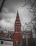 Image shows a tall, majestic building with a spire on the top in Dublin, Ireland