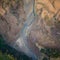 Image of a small creek flowing though the valley on a beautiful sunset light.