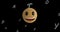 Image of smiley emoji icon floating over letters on black background