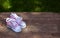 Image of sneakers wooden desk grass background