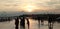 This is an image of sunset on the bank of river in India.