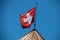 Image of swiss flag blowing in the wind