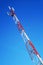 Image of a telecommunication tower against the blue sky