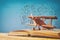 image of toy airplane and book over wooden table with set of back to school infographics