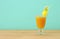 Image of tropical and exotic fruit coctail over wooden table.