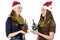 Image of two women with christmas fir tree