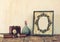 Image of victorian vintage antique classical frame, jewelry and perfume bottles on wooden table. filtered image